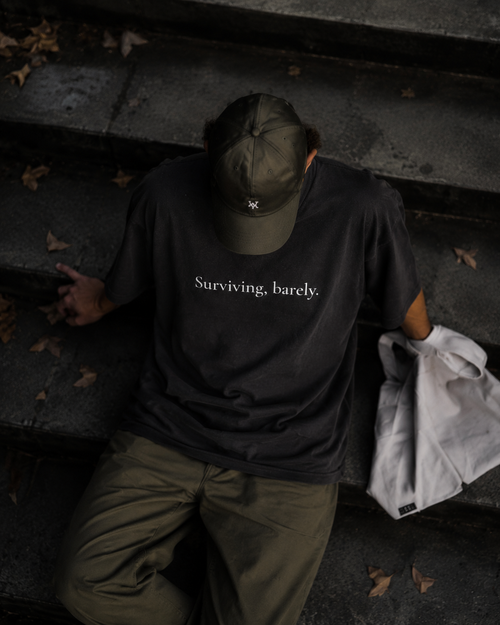 Surviving, barely. | Minimal graphic tee